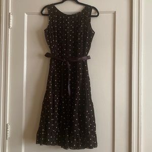 Sleeveless calf length brown dress with taupe color polka dots
